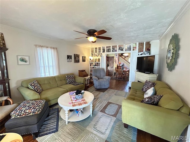 705 E Gibbs St, Salem, MO 65560 - living room featuring wood finished floors, ceiling fan, and ornamental molding