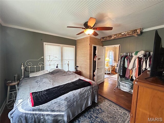 705 E Gibbs St, Salem, MO 65560 - bedroom with multiple windows, wood finished floors, ceiling fan, and crown molding