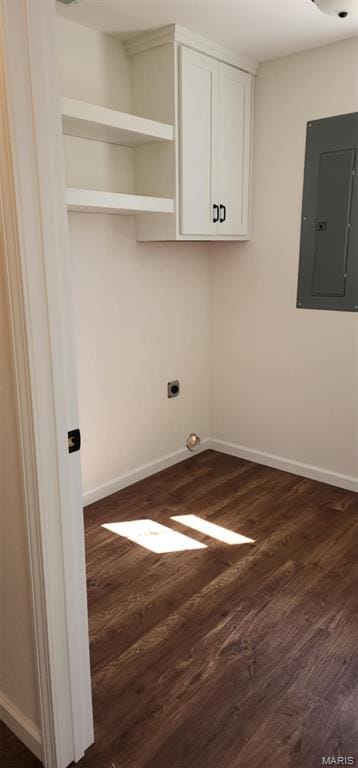 622 Scottsvale Dr, Rolla, MO 65401 - laundry room with electric panel, dark wood-type flooring, baseboards, cabinet space, and electric dryer hookup