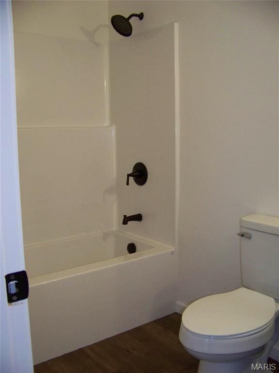 622 Scottsvale Dr, Rolla, MO 65401 - bathroom featuring shower / bathtub combination, toilet, and wood finished floors