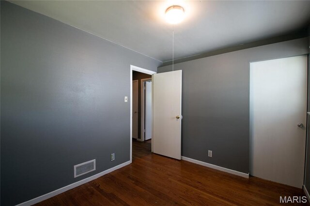 135 Dundee Cir, Saint Louis, MO 63137 - empty room with wood finished floors and baseboards