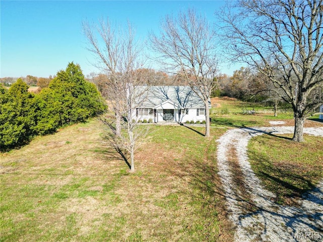 751 E Saint Eunice Rd, Fulton, MO 65251 - view of front of property with a front yard and a porch