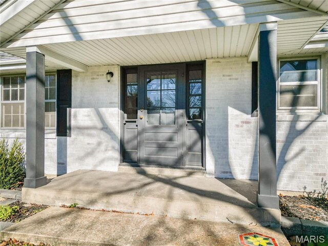 751 E Saint Eunice Rd, Fulton, MO 65251 - property entrance featuring brick siding and covered porch