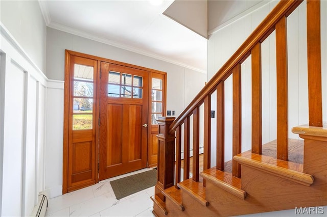 751 E Saint Eunice Rd, Fulton, MO 65251 - foyer entrance featuring baseboard heating, light marble finish flooring, crown molding, and a decorative wall