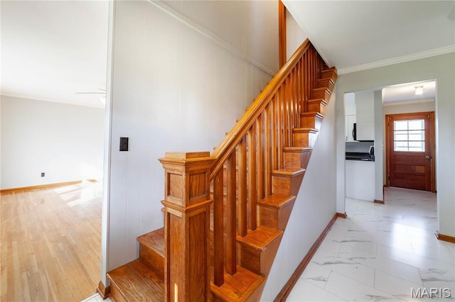 751 E Saint Eunice Rd, Fulton, MO 65251 - stairs with baseboards, crown molding, and marble look tile flooring