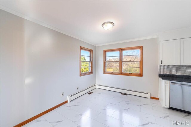 751 E Saint Eunice Rd, Fulton, MO 65251 - unfurnished dining area featuring baseboards, light marble finish flooring, and ornamental molding