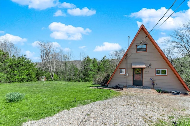 10518 Lakeview Circle Dr, Marthasville, MO 63357 - a-frame style home with a front lawn