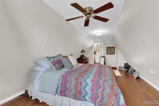 10518 Lakeview Circle Dr, Marthasville, MO 63357 - bedroom with wood finished floors, ceiling fan, vaulted ceiling, and baseboards