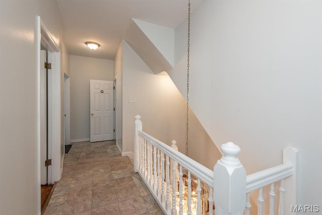 4340 Arsenal St, Saint Louis, MO 63116 - hallway featuring an upstairs landing and baseboards