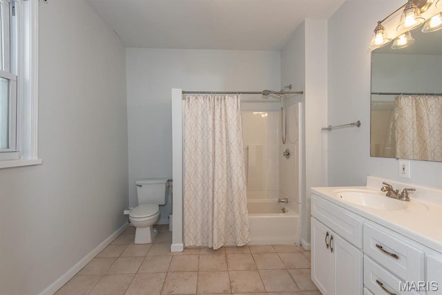 4340 Arsenal St, Saint Louis, MO 63116 - full bathroom with toilet, tile patterned floors, vanity, shower / tub combo with curtain, and baseboards