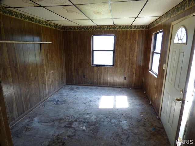 5086 Arlington Ave, Saint Louis, MO 63120 - empty room with wooden walls and a drop ceiling