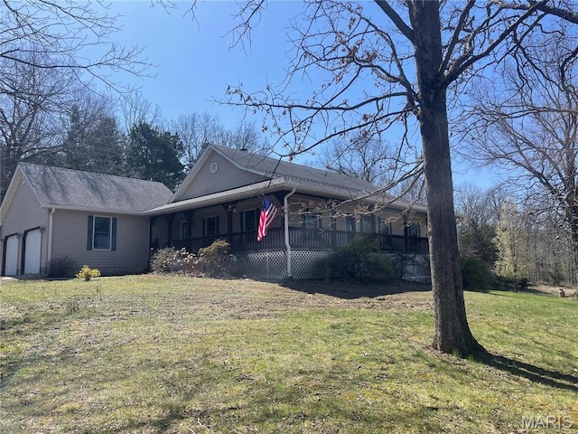 4101 Juedeman Rd, Mo, MO 65453 - view of property exterior featuring a porch, a yard, and an attached garage