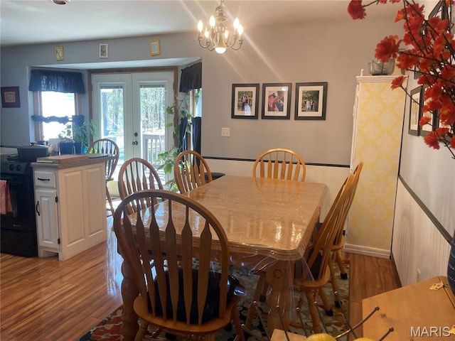 4101 Juedeman Rd, Mo, MO 65453 - dining area with light wood finished floors, french doors, and a chandelier