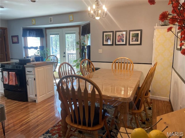 4101 Juedeman Rd, Mo, MO 65453 - dining room featuring light wood-type flooring, french doors, and a chandelier