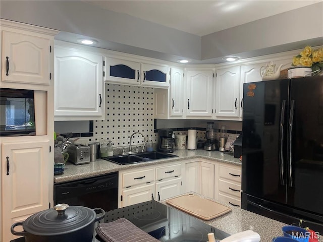 4101 Juedeman Rd, Mo, MO 65453 - kitchen with black appliances, a sink, white cabinetry, and light countertops