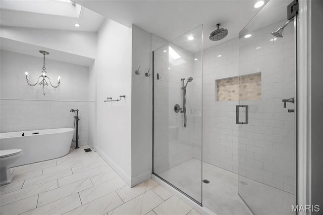 1304 Brynnwood Dr, Saint Louis, MO 63124 - full bath featuring marble look tiles, recessed lighting, a stall shower, and a soaking tub