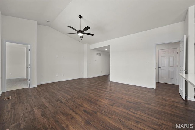 unfurnished living room with ceiling fan, lofted ceiling, dark wood-type flooring, and baseboards