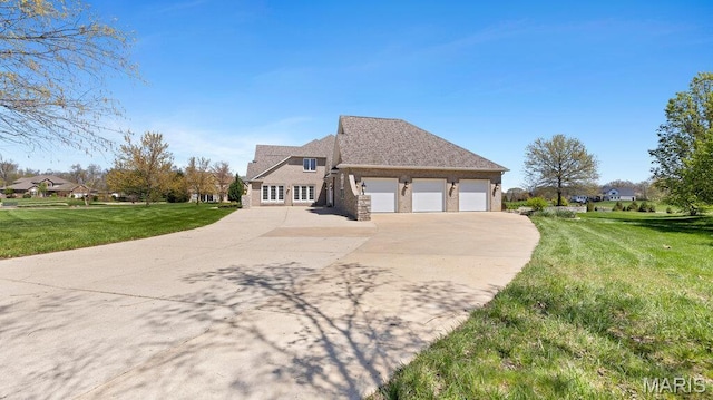 9108 Wiltshire Dr, Columbia, IL 62236 - view of front of home with driveway, a garage, and a front lawn