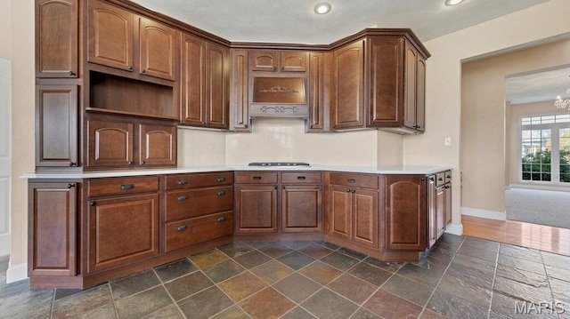 9108 Wiltshire Dr, Columbia, IL 62236 - kitchen featuring stone tile flooring, baseboards, recessed lighting, light countertops, and a chandelier