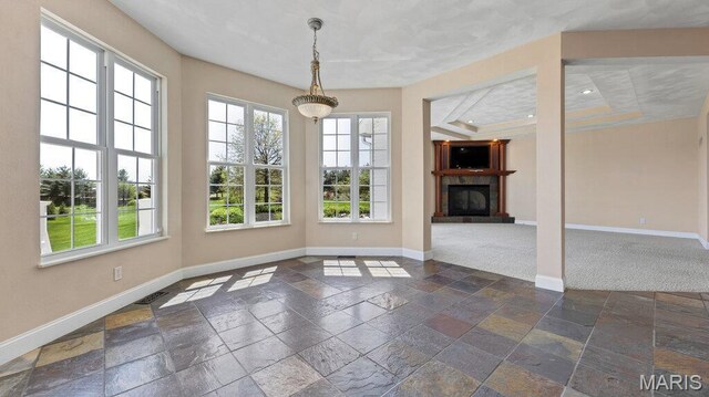 9108 Wiltshire Dr, Columbia, IL 62236 - unfurnished dining area with baseboards, stone tile flooring, a fireplace with raised hearth, and recessed lighting