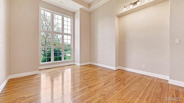 9108 Wiltshire Dr, Columbia, IL 62236 - unfurnished room with light wood finished floors, healthy amount of natural light, and baseboards