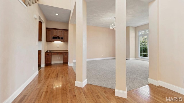 9108 Wiltshire Dr, Columbia, IL 62236 - hallway with baseboards and light wood finished floors