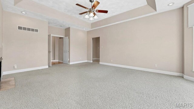 9108 Wiltshire Dr, Columbia, IL 62236 - empty room with a raised ceiling, a ceiling fan, light colored carpet, baseboards, and recessed lighting