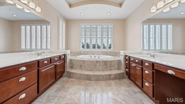 9108 Wiltshire Dr, Columbia, IL 62236 - bathroom featuring two vanities, a bath, and marble finish floors