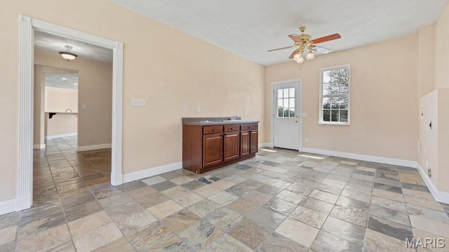 9108 Wiltshire Dr, Columbia, IL 62236 - interior space with stone tile floors, baseboards, and a ceiling fan