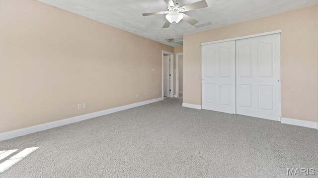 9108 Wiltshire Dr, Columbia, IL 62236 - unfurnished bedroom with carpet, baseboards, a closet, and a ceiling fan