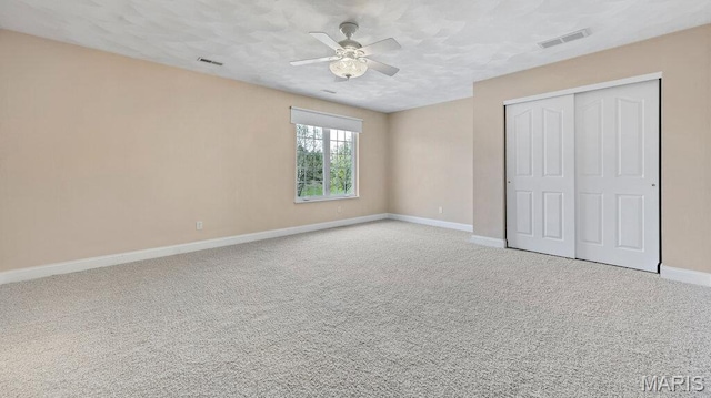 9108 Wiltshire Dr, Columbia, IL 62236 - unfurnished bedroom featuring baseboards, carpet, a closet, and a ceiling fan