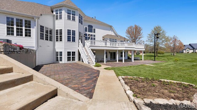9108 Wiltshire Dr, Columbia, IL 62236 - rear view of house with a patio, a deck, stairs, a yard, and a shingled roof