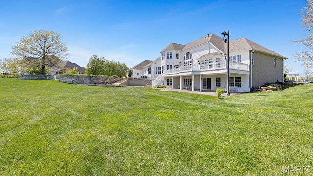 9108 Wiltshire Dr, Columbia, IL 62236 - rear view of property featuring a yard, a patio, a deck, and stairs