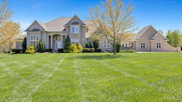 9108 Wiltshire Dr, Columbia, IL 62236 - view of front of home featuring a front yard and brick siding