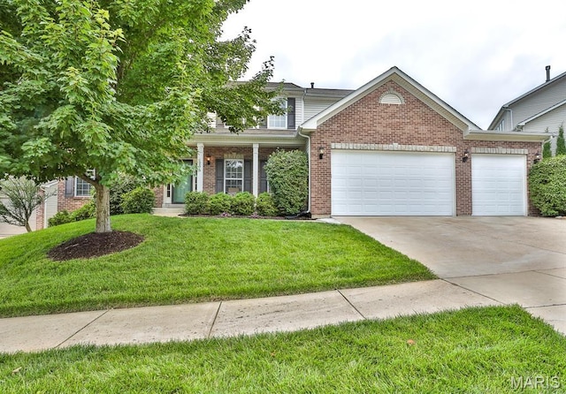 1256 Green Vale Ct, Fenton, MO 63026 - view of front of home with a garage, concrete driveway, brick siding, and a front yard