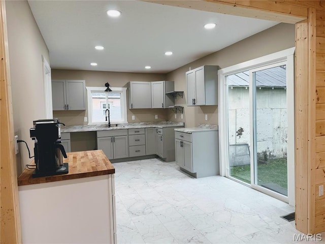 120 W Caldwell, La Plata, MO 63549 - kitchen featuring gray cabinets, wooden counters, and recessed lighting