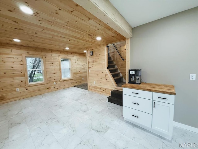 120 W Caldwell, La Plata, MO 63549 - bonus room featuring recessed lighting, stairway, wood walls, wood ceiling, and light marble finish flooring