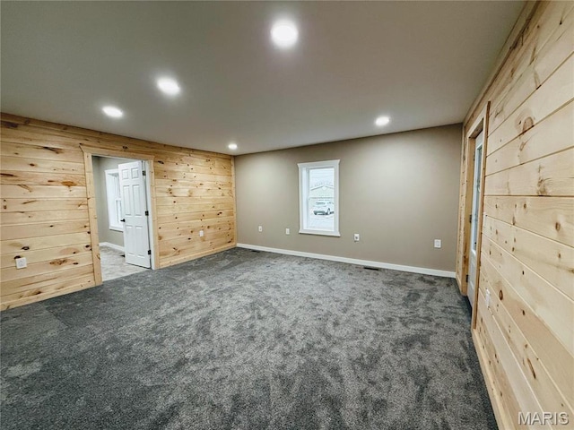 120 W Caldwell, La Plata, MO 63549 - unfurnished room with recessed lighting, carpet flooring, and wood walls