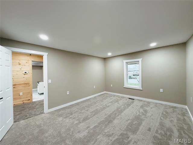 120 W Caldwell, La Plata, MO 63549 - carpeted empty room with recessed lighting