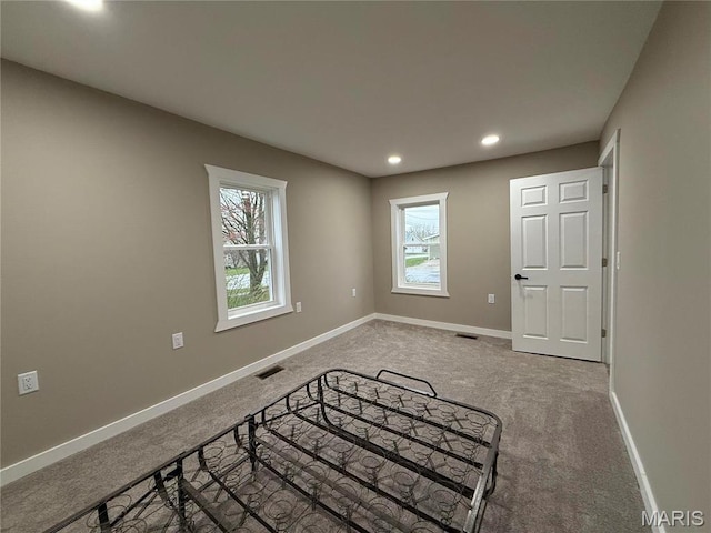 120 W Caldwell, La Plata, MO 63549 - unfurnished bedroom featuring carpet flooring and recessed lighting
