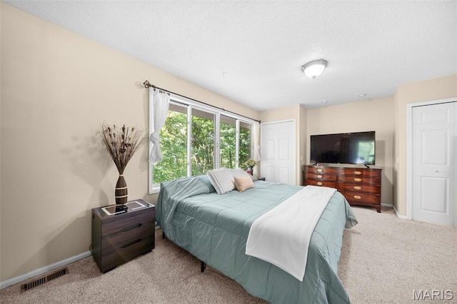 5 Cedar Fork Ct, Defiance, MO 63341 - carpeted bedroom with baseboards and a textured ceiling