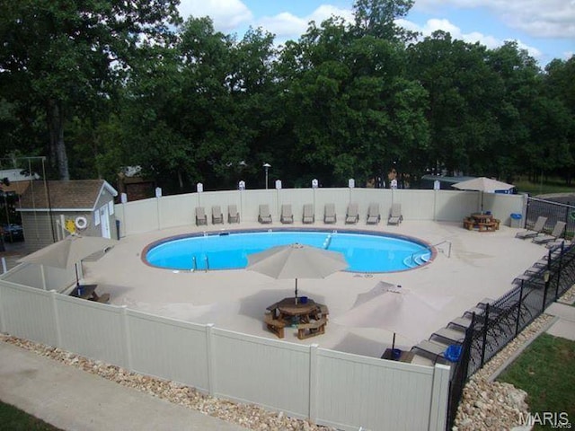 2793 Blackforest Dr Unit B, Saint Louis, MO 63129 - view of swimming pool with a patio area and fence