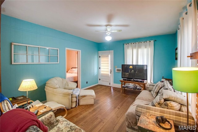 225 Tunison, White Hall, IL 62092 - living room with wood-type flooring, a ceiling fan, and baseboards