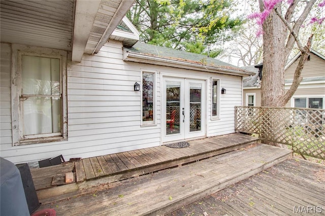 225 Tunison, White Hall, IL 62092 - property entrance featuring a deck, french doors, and a shingled roof