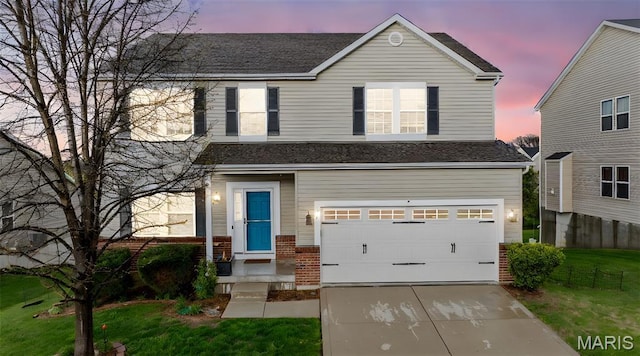 77 Brighton Park Dr, Saint Charles, MO 63303 - traditional-style home featuring an attached garage, driveway, and roof with shingles