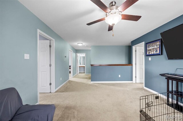 77 Brighton Park Dr, Saint Charles, MO 63303 - sitting room featuring carpet, a ceiling fan, and baseboards