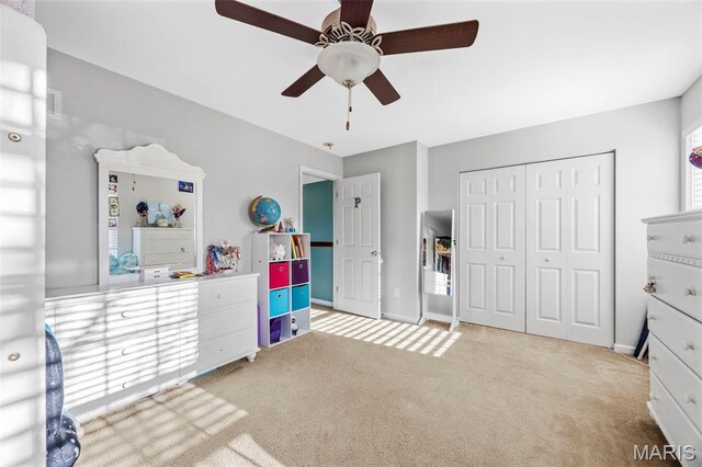 77 Brighton Park Dr, Saint Charles, MO 63303 - carpeted bedroom with a closet, baseboards, and ceiling fan