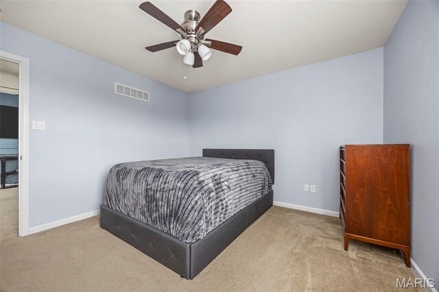 77 Brighton Park Dr, Saint Charles, MO 63303 - carpeted bedroom with baseboards and ceiling fan
