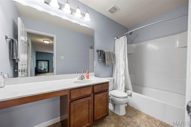 77 Brighton Park Dr, Saint Charles, MO 63303 - bathroom featuring vanity, shower / tub combo with curtain, toilet, and tile patterned floors