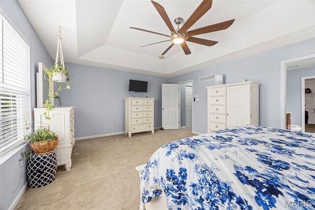 77 Brighton Park Dr, Saint Charles, MO 63303 - bedroom with a raised ceiling, light colored carpet, baseboards, and ceiling fan